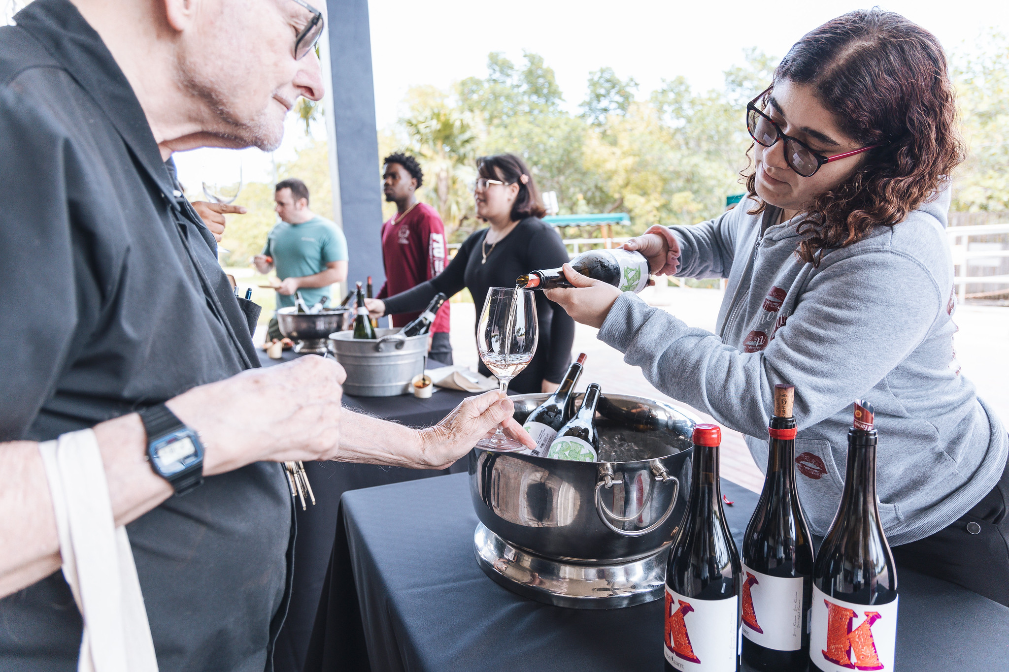 Attendees stomping on grapes