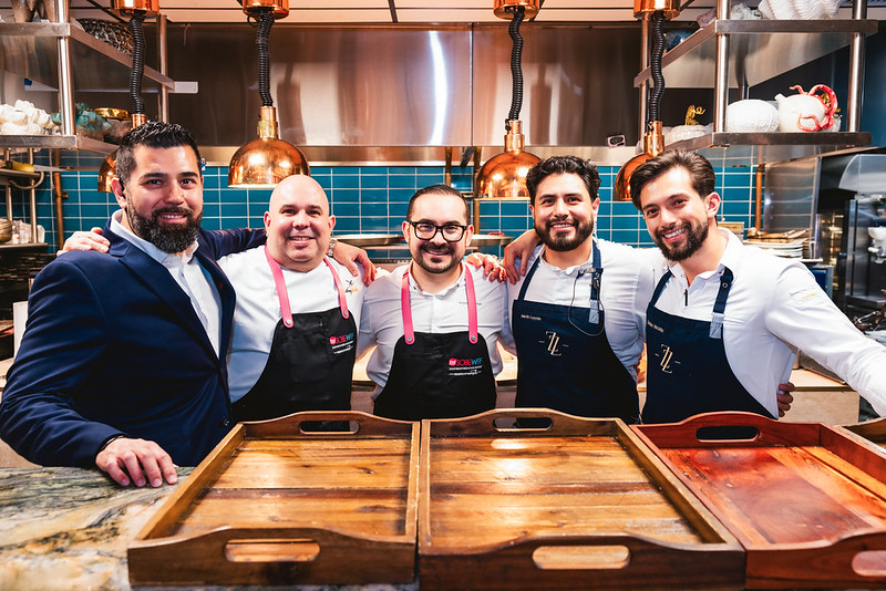 Attendees stomping on grapes