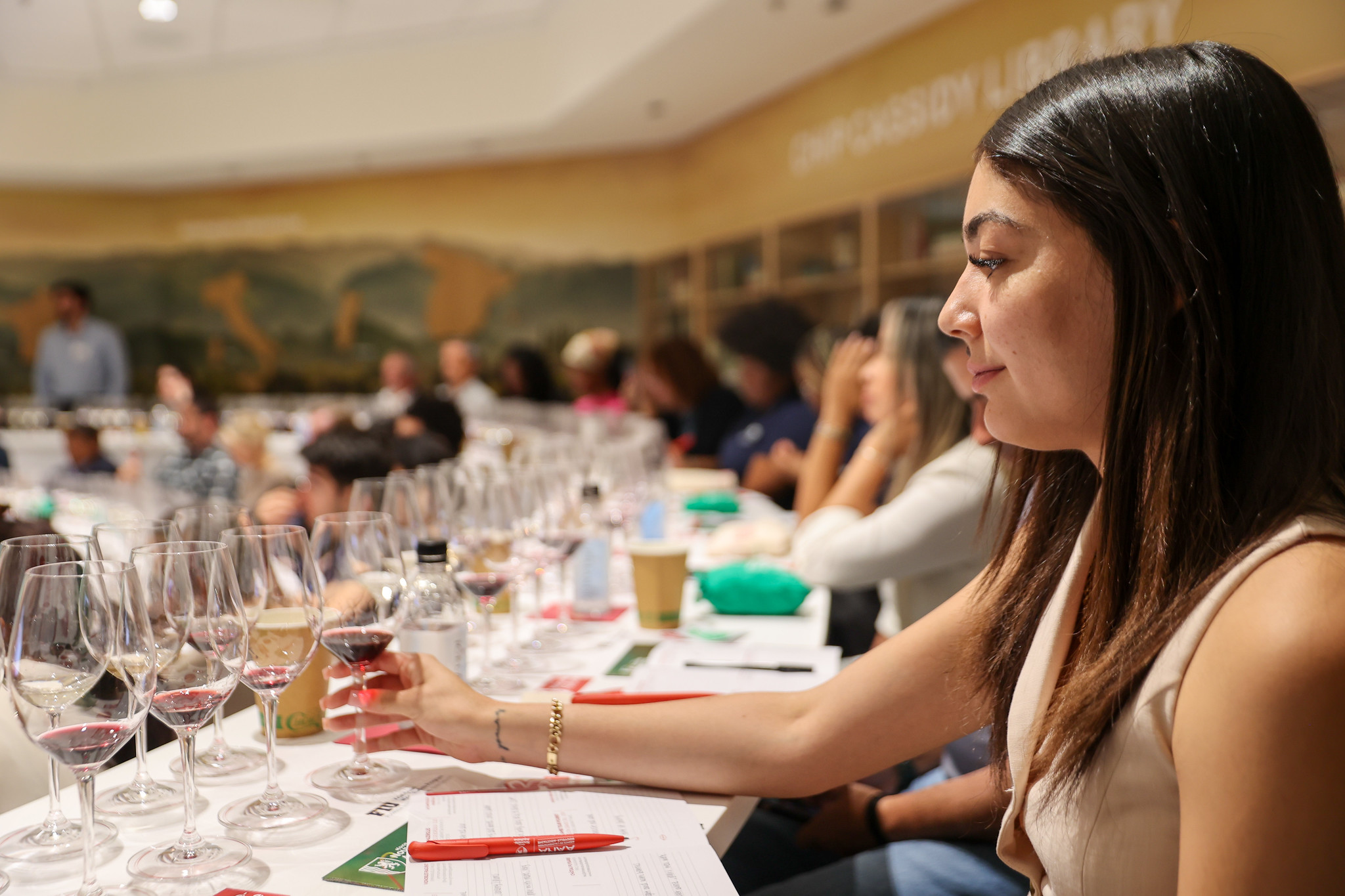 FIU wine glasses toasting